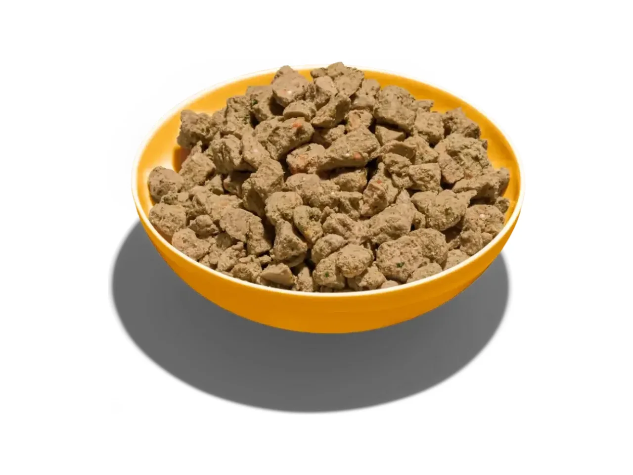 A yellow bowl of Lyka Barn Raised Turkey fresh dog food on a plain white background.