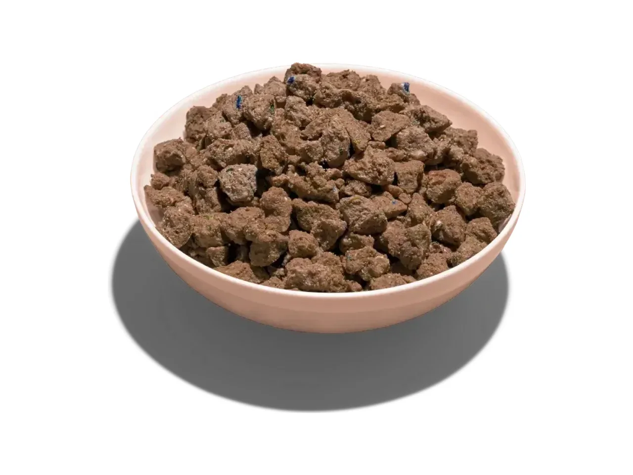 A pale blush bowl of Lyka Grass Fed Lamb fresh dog food on a plain white background.
